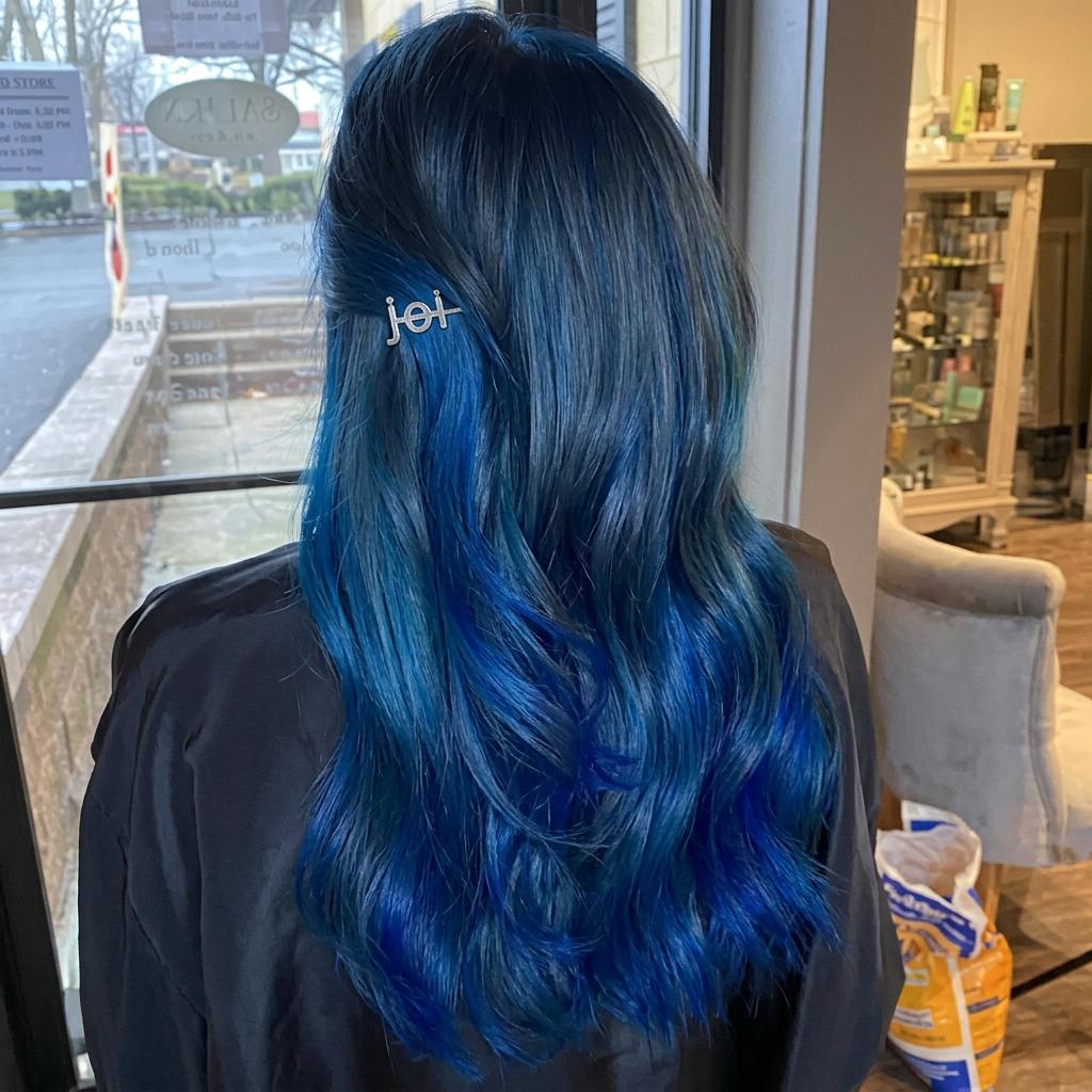 Vivid blue fashion hair color by Salon DP Lorana